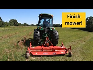 #109 Caroni finish mower on the John deere 4066R