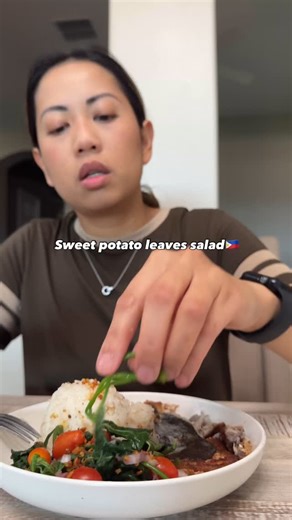 Katrina F. on Instagram: "I made talbos ng kamote salad just like my Ilocano grandma used to make. She’d blanch sweet potato leaves, add tomatoes and onions, then mix in a sauce made with calamansi juice and monamon dilis or bagoong isda which is a stronger, more pungent version of fish sauce. She’d also pair it with fried fish. Bagoong isda is generally more pungent than regular fish sauce. Fish sauce (or patis) is typically strained, leaving a clear, thin liquid. It has a salty, umami rich fla