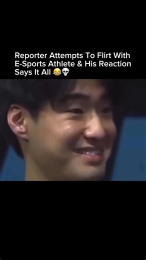 VIRAL | INTERESTING | PEOPLE on Instagram: "A live TV moment turned unexpectedly hilarious when a reporter tried to get a little too friendly with an esports athlete during an interview. As she lightly touched his arm, clearly trying to flirt on camera, he froze instantly — eyes wide, posture stiff, and absolutely no idea how to handle it. The delayed, awkward half-smile he gave the camera made the clip go viral within hours. It perfectly captured that classic gamer reaction: confused, polite, a