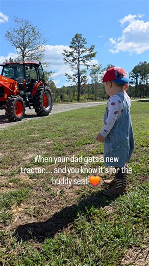 When your dad gets a new tractor but everyone knows it’s REALLY for the buddy seat 🚜🧒🏼 Sure, the land needs work and a tractor is handy… but let’s be honest...this was all about those daddy-beau rides. ❤️ Who else has a ‘buddy seat’ story with their little one? What’s your favorite daddy-kid tradition? | The Bradley Bunch