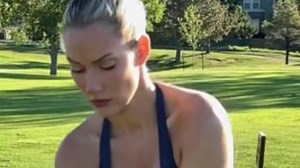 Paige Spiranac fans 'suddenly into golf' after slow-mo swing in plunging top