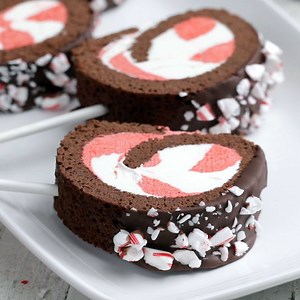 When a full-sized holiday peppermint roll cake is just too hard to resist, take a slice to go by putting it on a stick. | Tastemade