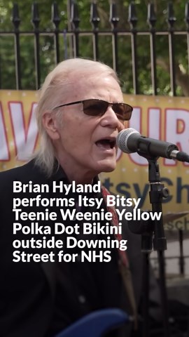 Brian Hyland performs Itsy Bitsy Teenie Weenie Yellow Polka Dot Bikini outside Downing Street for NHS campaign
