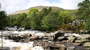 The Falls of Dochart are on the River Dochart at Killin in Stirling (formally in Perthshire), Scotland at the western end of Loch Tay.