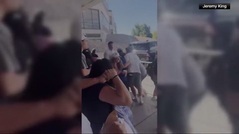 GRAPHIC: Video shows Charlie Kirk being rushed to SUV after he was shot, crowd running in chaos