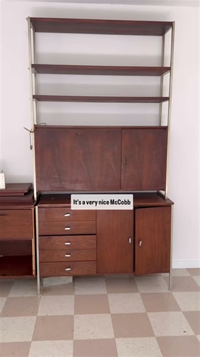 Delaware Valley House Parts on Instagram: "A mid-century pool house with Paul McCobb furniture, tiger wood wall paneling/cabinets and mid-century kitchenette with a round bar. All available and ready for their next chapter. Email Reggie@hvhouseparts.com for details. #midcentury #midcenturydesign #midcenturyfurniture #midcenturyinterior #tigerwood #kitchenette #houseparts"