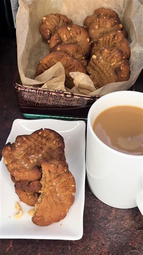 REGRETTING THIS AGAIN I just know that I will eat the bloody lot. Easy Peanut butter cookies with just 3 ingredients. 250g crunchy peanut butter 200g light brown soft sugar 1 medium egg Little bit of salt for the top and a cup of tea. - you are so welcome 1. Preheat oven to 180°C (160°C fan)Line 2 baking sheets with baking parchment. Beat all the ingredients together in a bowl until combined 2. Bake for 12mins leave to cool for 5min. 3. Pop onto a wire rack to cool #glutenfree #dairyfree #cookie