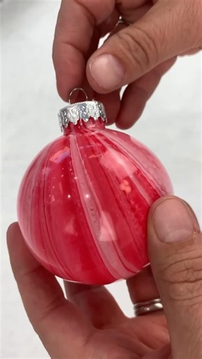 Art with Jenny K.® on Instagram: "Comment POUR PAINT and I’ll send you all the instructions for one of my most popular holiday ornament projects. 🎄 I have been doing this for years and I always find a new and fun way to make these around Christmas! This year my students made some for a school fundraiser and on Sunday I’m making a bunch with my daughter’s friends — they’ll be giving them away for gifts to their teachers!"