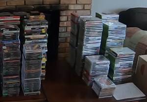 Watch YouTube couple sift through $100,000 worth of filth-covered vintage video games in hoarder's home