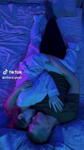 Intimate Moments: Cozy Cuddles in a Blue Bedroom