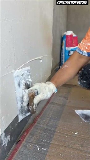 👷⚡ Precision Putty Application: Mason Sealing Wall Base Joints With Hand Trowel