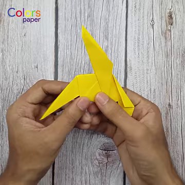 1.8K views · 128 reactions | In this step-by-step tutorial, we'll guide you through the process of making an easy origami bird using simple folding techniques. Join us as we introduce you to the world of origami and learn how to create a beautiful paper bird in just a few steps. #diy #craft #origami | Colors Paper | Facebook
