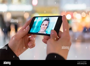 skype video call with a smartphone Stock Photo - Alamy