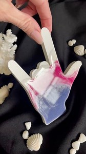 40K views · 859 reactions | This 13 cm I Love You resin hand (sign language for I love you) was created as a custom commission for a Canadian client. I love how the glittery pink and purple blend with flowing white waves to look like a glossy fantasy beach. Would you like your own? #signlanguage #resinartist #deafcommunity | Graphiq Design | Facebook