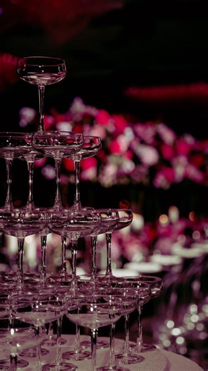 Pretty Mocktails 🍸 on Instagram: "If you’re planning your wedding reception and still finalizing details — this is your sign. This is the part of the reception everyone gathers around. The photos. The reactions. The moment. We only take a limited number of tower bookings per date. To book your tower moment email us your inquiry asap! 💌 info@prettymocktails.com #prettymocktails #champagnetower #champagnetoast #receptioninspo #2026weddingtrends"