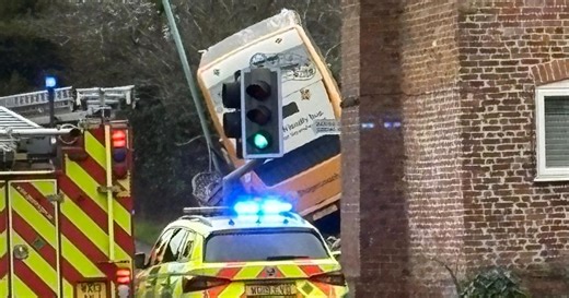 Double-decker bus veers off road and crashes into hedge