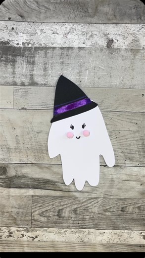 Halloween Handprint! This super friendly little ghost handprint is very simple to make! They make adorable decorations too 😍👻 You will need white and black card, a black marker, glue, scissors and pink pom poms (or a pink marker!) #craftideas #crafts #preschoolactivities #funcrafts #easycrafts #craft #preschoolathome #crafting #kidscrafts #funcraftskids #halloween #halloweencrafts | Home is Where the Art is