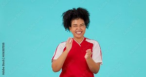 Congratulations, woman clapping her hands and sports against a blue background happy for success or goal. Achievement or applause, winner or celebrating female person cheer for good news in studio