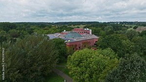 Aerial drone view of LWL Museum of Natural History with Planetarium . The Westphalian State Museum of Art and Cultural History is an arts and cultural museum in Münster , Germany .