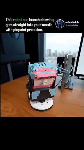 Artificial Intelligence (AI) on Instagram: "Viral videos showing a tiny robot named "Gummy" launching chewing gum into a person's mouth are authentic and demonstrate a real-life, functional prototype. However, the videos are a creative project from a Chinese video company called HTX Studio, and Gummy is not a commercially available product. Source:HTX Studio on YT Follow @techpulselab for Daily News and Updates! . . . . #technology#robot#robotics#techinnovation#artificialintelligenceai#ainewsdai