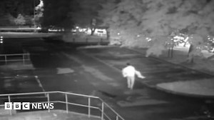 Cardiff: CCTV shows man carrying woman home to rape her