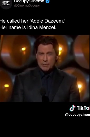 John Travolta mispronounced Idina Menzel's name as 'Adele Dazeem' while introducing her performance of 'Let It Go' at the 86th Academy Awards in 2014. The error became an immediate viral moment. Menzel was performing the Oscar-nominated song from Frozen. Travolta later apologized, citing nerves and the unusual phonetic spelling on the teleprompter. The mispronunciation spawned a website generator creating 'Travoltified' names. #Oscars #JohnTravolta #IdinaMenzel #OscarMoment #FilmHistory