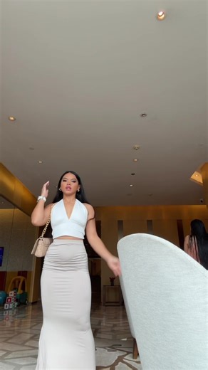 Chic Outfit Showcase: White Halter Top and Light Skirt