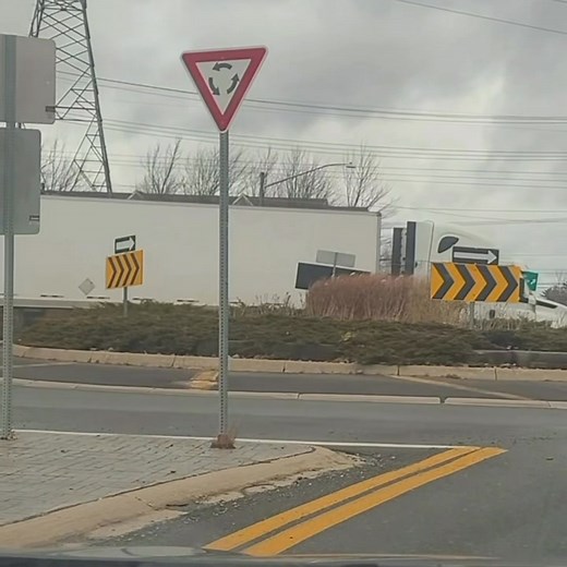 Do they just hand out licenses to anyone to drive trucks now? Check out this clip of a wrong way around the Brookside Dr roundabout! | Fredericton's Worst Drivers