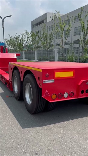 Width Adjustable and extendable, with a 70-ton payload customized low-bed trailer #suprotrailer