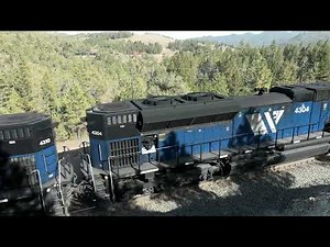 BNSF westbound oil train crosses Greenhorn Trestle, Mullan Pass MT.