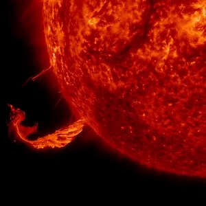Brief Outburst The Sun blew out a coronal mass ejection along with part of a solar filament over a three-hour period (Feb. 24, 2015). While some of the strands fell back into the Sun, a substantial part raced into space in a bright cloud of particles (as observed by the SOHO spacecraft). The activity was captured in a wavelength of extreme ultraviolet light. Because this occurred way over near the edge of the Sun, it was unlikely to have any effect on Earth. Credit: NASA/Goddard/SDO | NASA’s God