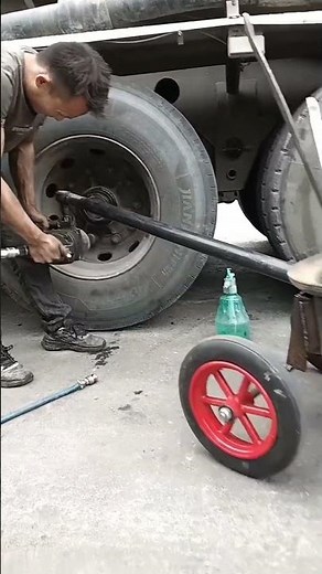 Unloading truck tires with pneumatic drill