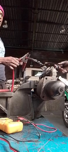 🛠️ Testing a Starter Motor on the Bench (Mechanic Style) Sometimes the car refuses to start, so we take the starter out and test it like it’s writing its final exam. 🎓😂 Here’s how we test it: 1. Negative cable to the body Clamp the black cable to the metal casing. That’s the grounding of the relationship. ⚡️😅 2. Positive cable to the big terminal This powers the motor. If it spins fast — it’s alive! 🌀 If it spins lazy — it needs energy drink. 🥤😂 3. Now test the solenoid Touch the positive