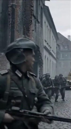 German Troops Move Through Ruined City — WW2