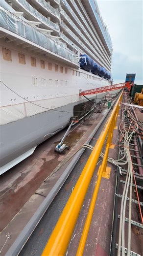 Tony Ruggero on Instagram: "Day 11 of Discovery Princess dry dock. Today the shipyard painting team applied a layer of paint known as tiecoat (grey paint) on the ship’s underwater hull. After a minimum curing time of 4 hours, an additional coat of black paint was applied. Weather permitting, a final coat of red silicone paint will be applied tomorrow.#discoveryprincess #princesscruises #cruising #singapore #cruise #drydock #paint #weather #asia #painting"