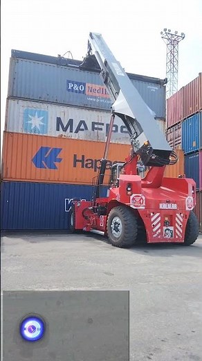 Kalmar Reach stacker with a tilting spreader for container handling
