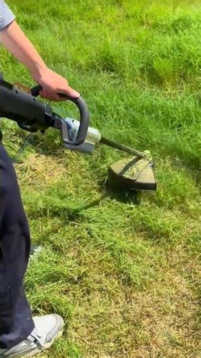 Cutting Overgrown Grass Efficiently Using a Powerful String Trimmer #shorts