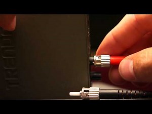 Disconnect and Connect an ST Fiber Optic Cable Connector