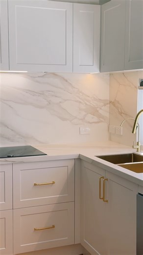 1.7K views · 30 reactions | Lisa’s lovely kitchen renovation we completed. 2pac cabinetry, gold upgrades, Sirius undermount and hidden rangehood & Porcelain benchtops, splashbacks and waterfall panels with a generous 1200mm island benchtop. All completed inhouse, 﫶 #kitchenrenovations #melbourne #interiorstyling #beforeandafter #design #home #homeimprovement #kitchentransformation #kitchen #kitchendesign | United Stone Melbourne | Facebook