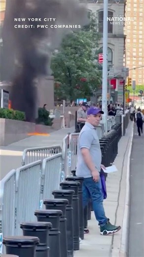 NEW VIDEO | Suspect seen throwing object into fire after NYC explosion