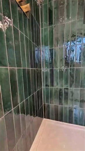 What about this for a project by @luxe28tiling! 📺🚿 A beautiful shower and bathroom with stunning dark luxurious green tiles with a transition into 600 x600 mm stone-effect porcelain tiles out-side of the shower. 💫 This project was fixed and grouted with BAL, with tiles from @mandarinstoneofficial, trims from @genesisglobalsystems, cutting blades and pads from @protilertools & cutter @rubitools What a beauty!! 😍 #BathroomDesign #LuxuryTiles #ShowerInspiration #HomeRenovation #InteriorDesign #