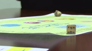 Local nun creates board game with COVID-19 theme