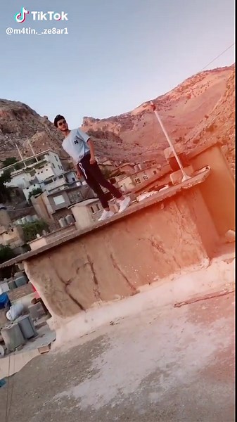 Nikon D5000 Camera Overview with Rooftop Background