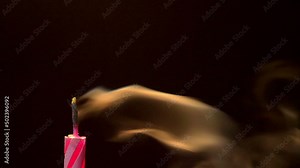 pink birthday candle being blown out extreme close up - 50fps Stock Video