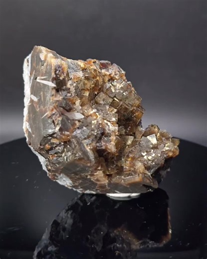 Beautiful fluorite specimen, with minor calcite and Celestine, from Clay Center, Ohio. The root beer brown color is classic for this locality, with an amazing reaction to UV. UVa, b, and c all give distinctive color reactions #minerals #uvminerals #claycenter #fluorite #calcite #celestine #usminerals