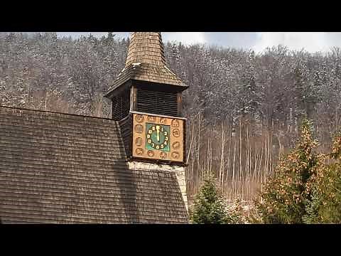 Church tower clock Bell strikes 12 o'clock