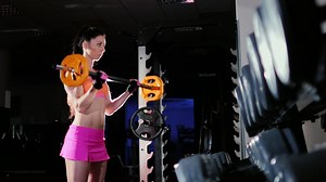 Strong Athletic Woman Training With A Barbell In The Gym Female Bodybuilding Slow Motion | Premium Stock Video Footage