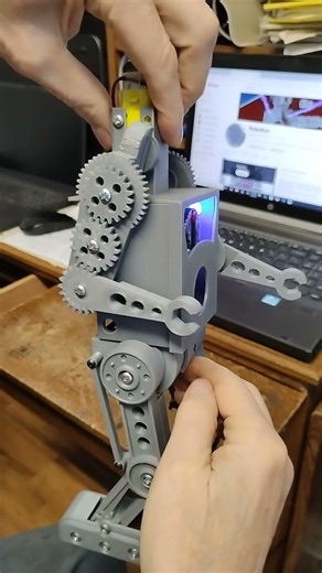 Adding Mechanical arms to the 3d printed differential walking robot project.