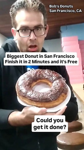 9.6K views · 60 reactions | In San Francisco, you'll find a giant 2 pound donut challenge at Bobs Donuts. Eat it in 2 minutes and it's free. Eat it in 3 and still get a T-shirt. What are your chances? #donuts #doughnuts #foodies #sanfrancisco #bayarea #localeats #localfood #grub #eatingchallenge #chocolate #foodchallenge #breakfastideas #wednesdayvibes #travels #vibes #lockin #runnerslife | Freak Eating | Facebook