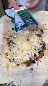 I learned this in California I make a fun and easy dish with tortillas, ground beef, taco seasoning, sliced olives, pickled jalapeños, Mexican cheese and more that I learned how to make in California This original video was produced by Network Media, LLC and Nebby's America | Home Hacks & Easy Snacks